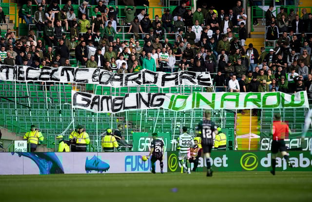 Celtic fans are known for having a pop at the board through banners at matches