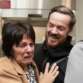 Scottish construction engineer Brian Glendinning with his mother Meta Glendinning after arriving at Edinburgh Airport