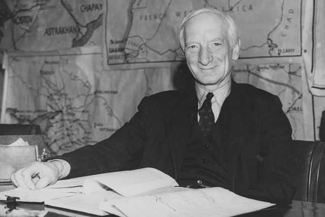 Economist William Beveridge (1879-1963) with his famous report at the Ministry of Information in December 1942. (Picture: Central Press/Hulton Archive/Getty Images)
