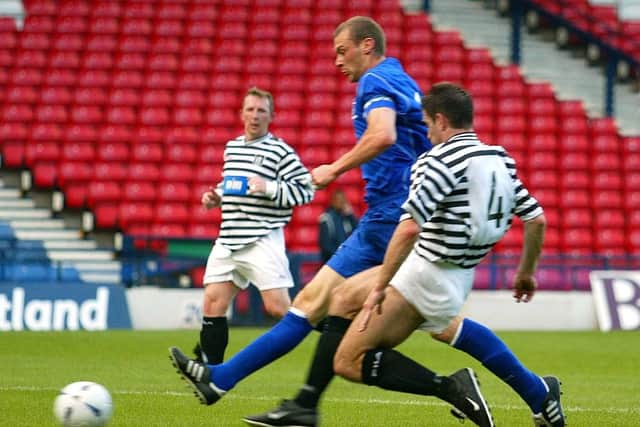 Duncan Ferguson scores in a friendly for Everton at Queen's Park in 2003. It proved his only goal at Hampden Park.