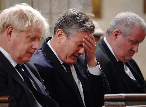 The then Prime Minister Boris Johnson, Labour party leader Sir Keir Starmer and SNP Westminster leader Ian Blackford attend a service to honour Sir David Amess at St Margaret's church in London last year (Picture: Jonathan Brady/WPA pool/Getty Images)