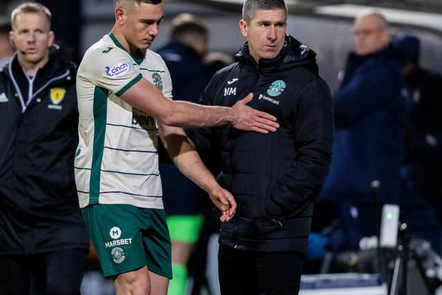 Hibs defender Lewis Mille with manager Nick Montgomery after being sent off against Dundee. (Photo by Ross Parker / SNS Group)