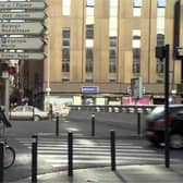 A French sign permitting cyclists to turn right on red after giving way to other traffic and pedestrians. There are similar signs for going straight ahead at some junctions