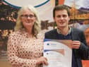 Chair of the Cairngorms Tourism Partnership, Xander McDade receives the award in Brussels