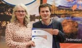 Chair of the Cairngorms Tourism Partnership, Xander McDade receives the award in Brussels