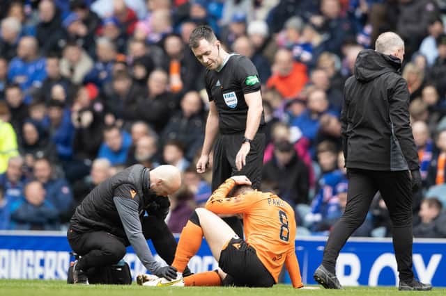 Dundee Utd's Peter Pawlett aggravated his hamstring injury in the defeat by Rangers.
