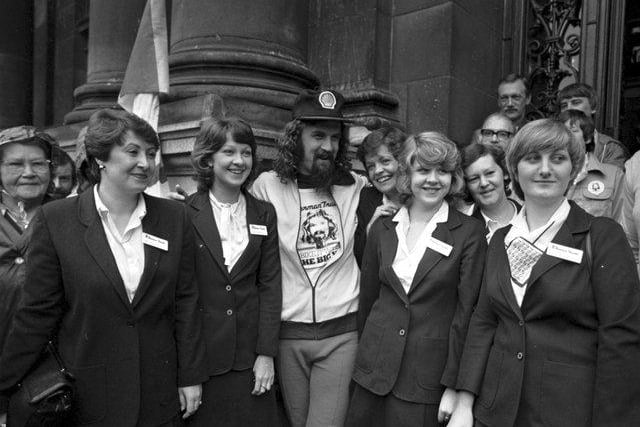 Scottish entertainer Billy Connolly leaves Glasgow on a sponsored cycle ride to Inverness in August 1980. Billy with some of the girls from the Ellerman Travel company.