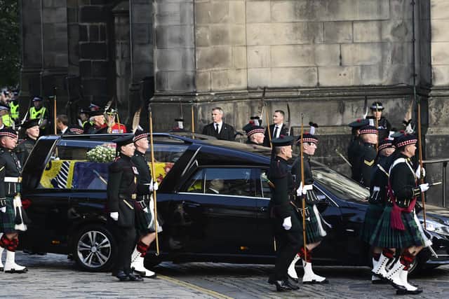 The coffin of Queen Elizabeth II arrives at St Giles' Cathedral after being transported from her private estate at Balmoral. Picture: John Devlin