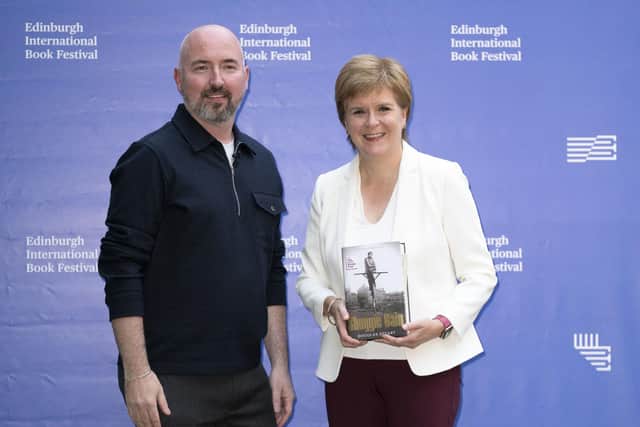 First Minister Nicola Sturgeon with Douglas Stuart before attending the Edinburgh International Book Festival to discuss his bestselling novel Shuggie Bain.   Jane Barlow/PA Wire