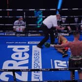 Josh Taylor celebrates his first-round win over Thailand's Apinun Khongsong.