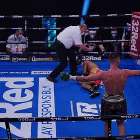 Josh Taylor celebrates his first-round win over Thailand's Apinun Khongsong.