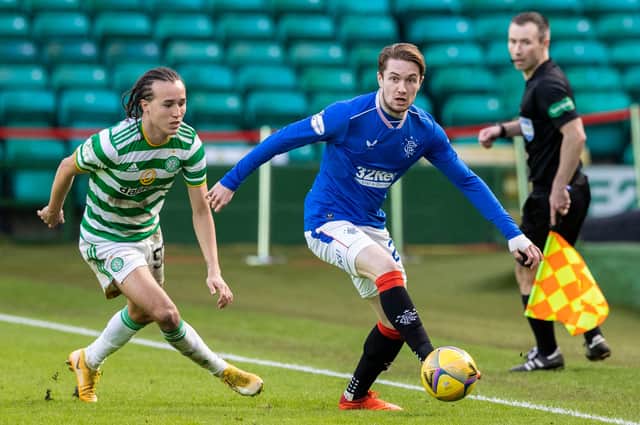 Scott Wright of Rangers and Celtic full-back Diego Laxalt in action during the last Old Firm meeting