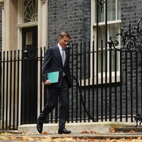 Jeremy Hunt leaves Downing Street to present his autumn statement to the House of Commons (Picture: Dan Kitwood/Getty Images)