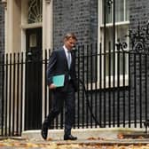 Jeremy Hunt leaves Downing Street to present his autumn statement to the House of Commons (Picture: Dan Kitwood/Getty Images)