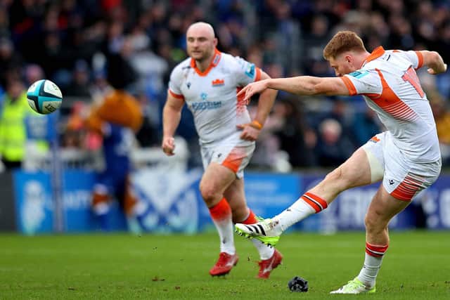 Edinburgh's Ben Healy kicks a penalty.