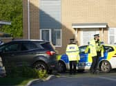 Police at the scene in Meridian Close, Bluntisham, Cambridgeshire, where police found the body of a 32-year-old man with a gunshot wound on Wednesday evening. They were later called to a second property in Ely, Cambridgeshire, where they found the body of a 57-year-old man who had also died from gunshot wounds. The deaths of both men are being treated as murder and three men have been arrested by Cambridgeshire Police. Picture date: Thursday March 30, 2023.