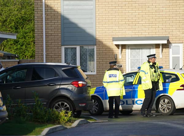Police at the scene in Meridian Close, Bluntisham, Cambridgeshire, where police found the body of a 32-year-old man with a gunshot wound on Wednesday evening. They were later called to a second property in Ely, Cambridgeshire, where they found the body of a 57-year-old man who had also died from gunshot wounds. The deaths of both men are being treated as murder and three men have been arrested by Cambridgeshire Police. Picture date: Thursday March 30, 2023.