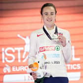 Laura Muir, of Great Britain, poses with her gold medal on the podium of the Women 1500 meters at the European Athletics Indoor Championships at Atakoy Arena in Istanbul, Turkey, Saturday, March 4, 2023. (AP Photo/Francisco Seco)