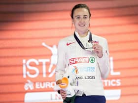 Laura Muir, of Great Britain, poses with her gold medal on the podium of the Women 1500 meters at the European Athletics Indoor Championships at Atakoy Arena in Istanbul, Turkey, Saturday, March 4, 2023. (AP Photo/Francisco Seco)