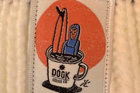 The surf-inspired logo of the Dook Cafe, West Sands, St Andrews