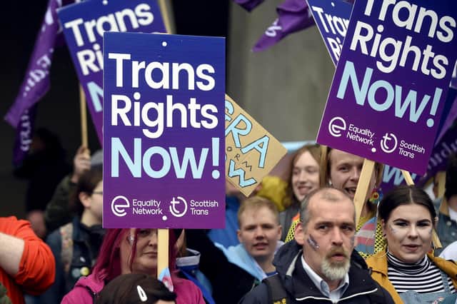 Trans rights campaigners demonstrate outside the Scottish Parliament (Picture: Lisa Ferguson)
