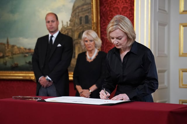 Prime Minister Liz Truss signing the Proclamation of Accession of King Charles III during the Accession Council ceremony at St James's Palace, London, where King Charles III is formally proclaimed monarch. Picture; 10/09/2022
