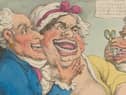 A French dentist shows an example of his false teeth in an picture from 1811 (Artist Thomas Rowlandson/Heritage Images via Getty Images)