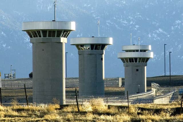 Guard towers loom over a maximum-security federal prison called Supermax near Florence, Colorado (Picture: Chris McLean/The Pueblo Chieftain via AP)
