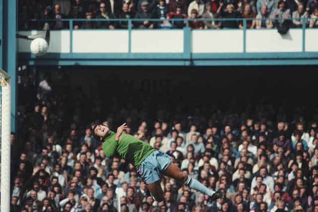 John Burridge in his earlier days making a flying save while playing for Aston Villa against QPR at Loftus Road on September 11, 1976 (Photo Tony Duffy/Allsport/Getty Images)