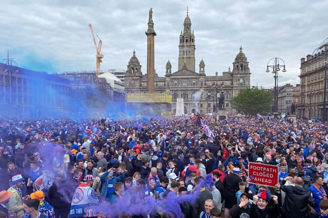 Police in Glasgow concerned about public health as they move crowds of Rangers fans to George Square