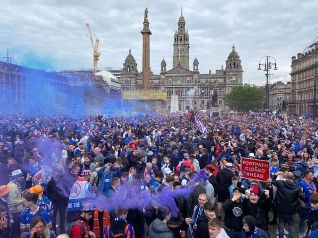 Police in Glasgow concerned about public health as they move crowds of Rangers fans to George Square
