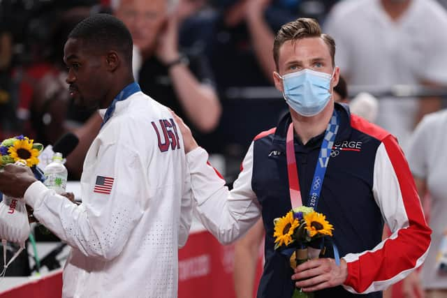 Silver medallist Rai Benjamin, left, and gold medallist Karsten Warholm following the men's 400m hurdles. Picture: Christian Petersen/Getty Images