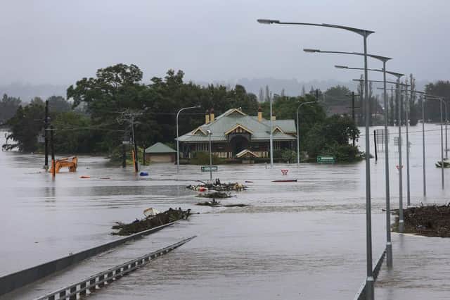 The Windsor Bridge submerged under rising floodwaters along the Hawkesbury River in Sydney, Australia (Photo: Lisa Maree Williams/Getty Images)