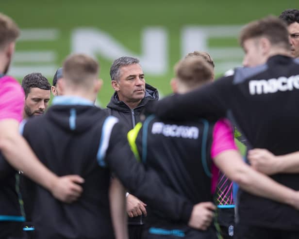 Franco Smith addresses his Glasgow Warriors players during an open training session at Scotstoun in April. (Photo by Ross MacDonald / SNS Group)