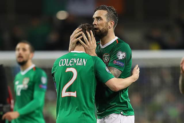 Seamus Coleman and Shane Duffy embrace following the Republic of Ireland's 1-0 win against Georga in March 2019