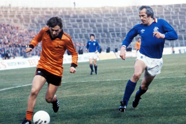 Dundee United's Paul Sturrock (left) takes the ball past Colin Jackson in their defeat by Rangers in the 1981 League Cup final