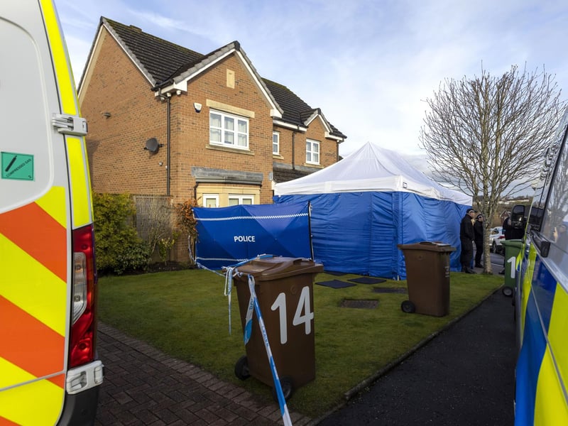 Officers from Police Scotland outside the home of former chief executive of the Scottish National Party (SNP) Peter Murrell, in Uddingston, Glasgow, after he was "released without charge pending further investigation", after he was arrested on Wednesday as part of a probe into the party's finances.