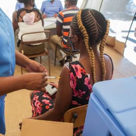 A woman is vaccinated against Covid in Harare, Zimbabwe, but many in the world's poorest countries are not so fortunate (Picture: Tafadzwa Ufumeli/Getty Images)