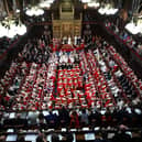 King Charles III sits alongside Queen Camilla as he reads the King's Speech from the The Sovereign's Throne in the House of Lords chamber during the State Opening of Parliament in July this year (Picture: Henry Nicholls/WPA Pool/Getty Images)