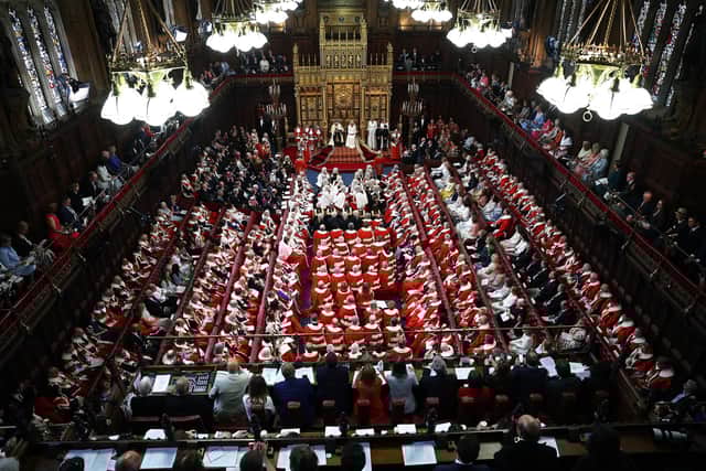 King Charles III sits alongside Queen Camilla as he reads the King's Speech from the The Sovereign's Throne in the House of Lords chamber during the State Opening of Parliament in July this year (Picture: Henry Nicholls/WPA Pool/Getty Images)