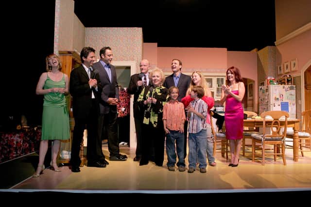 SANTA MONICA, CA - APRIL 28: (L-R) Monica Horan, Ray Romano, Brad Garrett, Peter Boyle, Doris Roberts, Exec. Prod./co-creator Phil Rosenthal, Sullivan Sweeten, Sawyer Sweeten Madylin Sweeten and Patricia Heaton attend the Everybody Loves Raymond Series Wrap Party at Hanger 8 on April 28, 2005 in Santa Monica, California. (Photo by Kevin Winter/Getty Images)