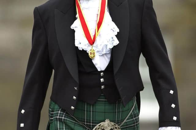 Sir Sean Connery after being knighted by the Queen at the Palace of Holyroodhouse in 2000. Picture: David Cheskin/PA.