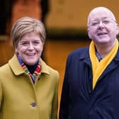 Nicola Sturgeon votes with her husband Peter Murrell in December 2019