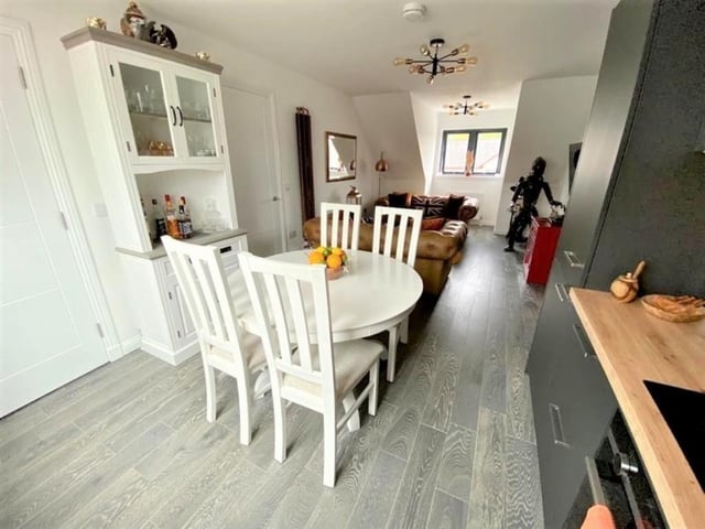 Living room, kitchen and dining area.
