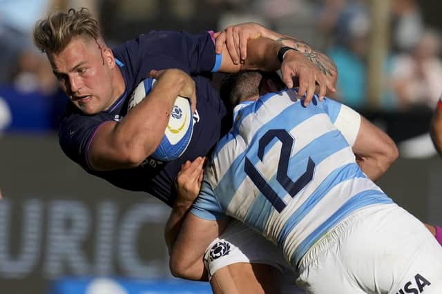 Scotland's Duhan van der Merwe, left, is tackled by Argentina's Los Pumas Jerónimo de la Fuente during their rugby test match in Salta, Argentina, Saturday, July 9, 2022. (AP Photo/Natacha Pisarenko)