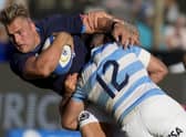 Scotland's Duhan van der Merwe, left, is tackled by Argentina's Los Pumas Jerónimo de la Fuente during their rugby test match in Salta, Argentina, Saturday, July 9, 2022. (AP Photo/Natacha Pisarenko)