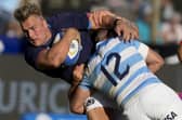 Scotland's Duhan van der Merwe, left, is tackled by Argentina's Los Pumas Jerónimo de la Fuente during their rugby test match in Salta, Argentina, Saturday, July 9, 2022. (AP Photo/Natacha Pisarenko)