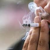 The proportion of adults who reported themselves to be current smokers in 2021 was 11 percent, down from 28 per cent in 2003.