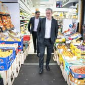 Labour Party leader Sir Keir Starmer (foreground) and Anas Sarwar, leader of the Scottish Labour Party, during a visit to the Stalks & Stem store, a small business in Shawlands, Glasgow. Picture: Jane Barlow/PA Wire