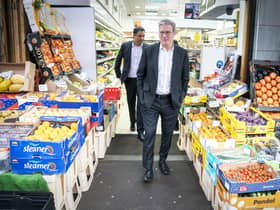 Labour Party leader Sir Keir Starmer (foreground) and Anas Sarwar, leader of the Scottish Labour Party, during a visit to the Stalks & Stem store, a small business in Shawlands, Glasgow. Picture: Jane Barlow/PA Wire
